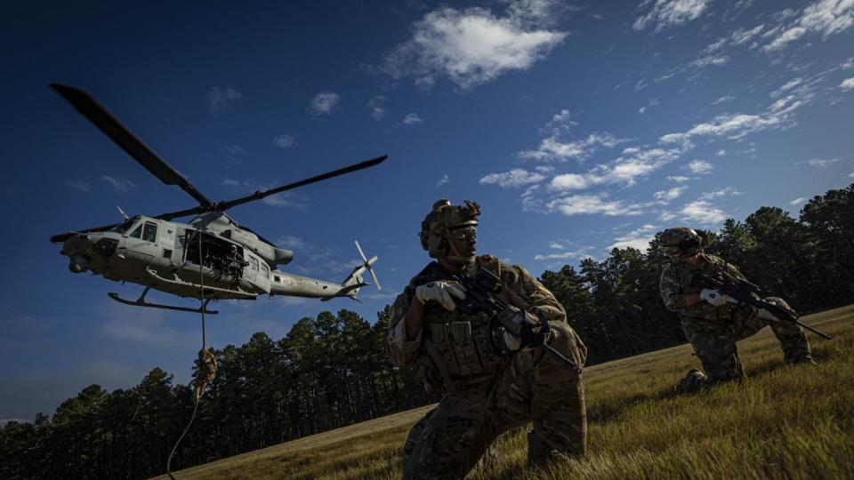 Special Warfare airmen with the New Jersey Air National Guard’s 227th Air Support Operations Squadron fast rope from a Marine Corps UH-1Y Venom helicopter during training on Joint Base McGuire-Dix-Lakehurst, N.J., in October 2019. (Master Sgt. Matt Hecht/Air National Guard)