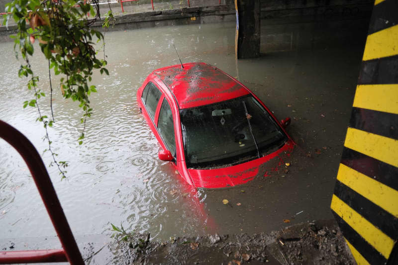 A car stands in water under a railway line in a flooded tunnel. Heavy persistent rainfall has led to flood warnings on many rivers and streams in the Czech Republic. The highest warning level is 3 ("Danger") was in effect at more than 25 gauges on Saturday morning. Water levels are expected to rise further over the weekend. Sznapka Petr/CTK/dpa