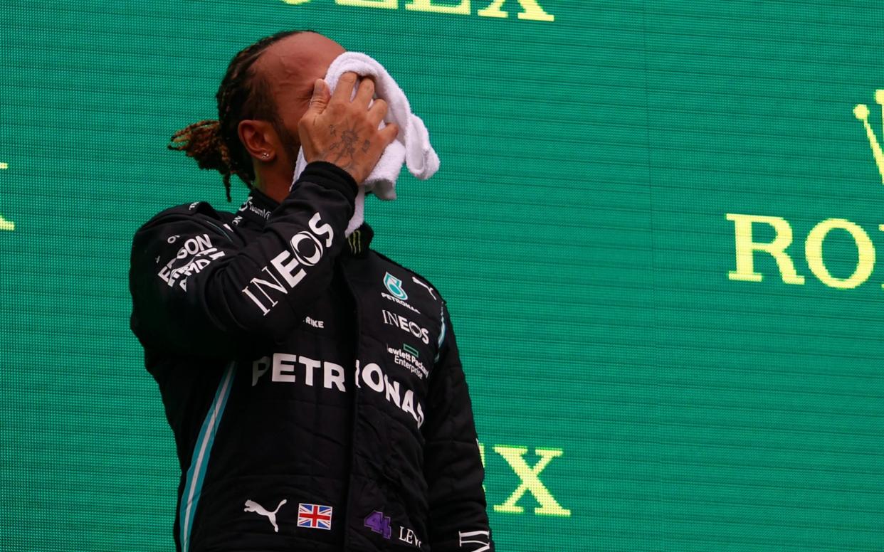 Lewis Hamilton was visibly struggling physically after the 70-lap race - REUTERS