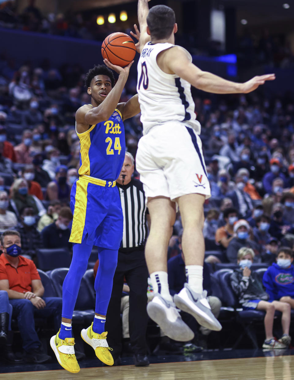 Pittsburgh guard William Jeffress (24) shoots under pressure from Virginia guard Taine Murray (10) during an NCAA college basketball game in Charlottesville, Va., Friday, Dec. 3, 2021. (AP Photo/Andrew Shurtleff)