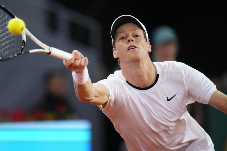 Jannik Sinner of Italy returns the ball to Pavel Kotov of Russia during the Mutua Madrid Open tennis tournament in Madrid, Spain, Monday, April 29, 2024. (AP Photo/Manu Fernandez)