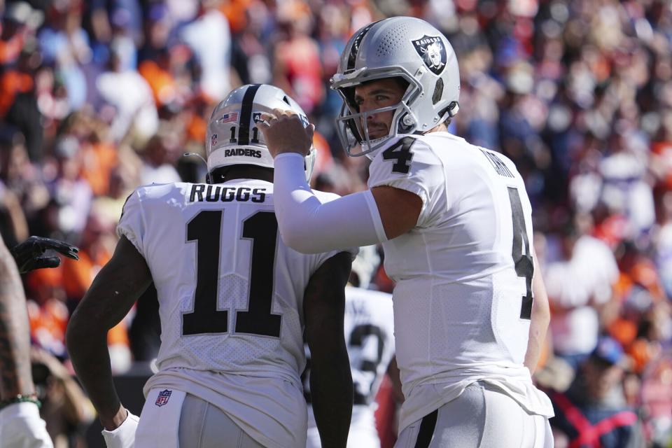 Las Vegas Raiders wide receiver Henry Ruggs III scores a touchdown.