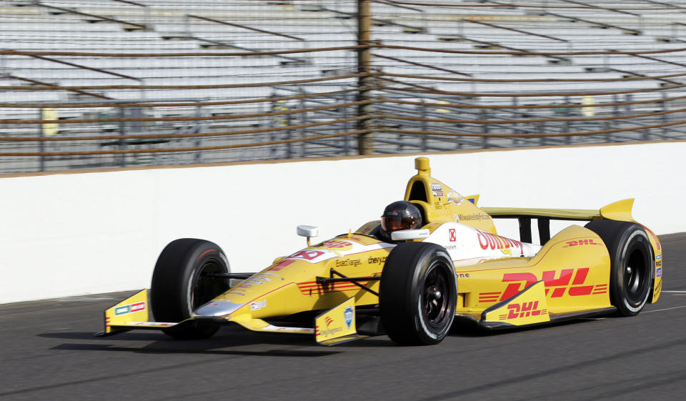 FILE - In this May 9, 2013 file photo, NASCAR driver Kurt Busch drives down the front straightaway in an Andretti Autosport Indycar during a testing session at the Indianapolis Motor Speedway in Indianapolis. Kurt Busch and Andretti Autosport announced Tuesday, March 4, 2014, that he will try to become the first driver in 10 years to run the Indianapolis 500 and the Coca-Cola 600 on the same day. (AP Photo/AJ Mast, File)