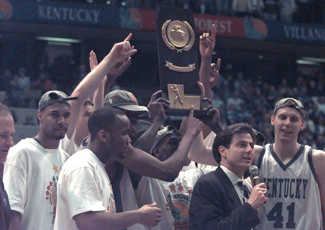 Rick Pitino and the Kentucky Wildcats celebrate after winning the 1996 national championship.