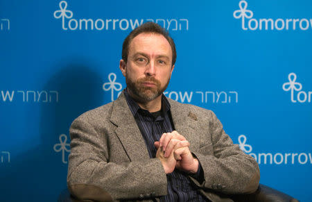 FILE PHOTO - Jimmy Wales, founder of the user-edited online encyclopedia Wikipedia, pauses during an interview with Reuters at the Israeli Presidential Conference in Jerusalem October 21, 2009. REUTERS/Ronen Zvulun/File Photo