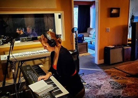 Ada-Nicole Sanger works on her music in a studio in Florida. Sanger, whose mother and father are from Kittery and Sanford, Maine, respectively, visits Vacationland every summer.
