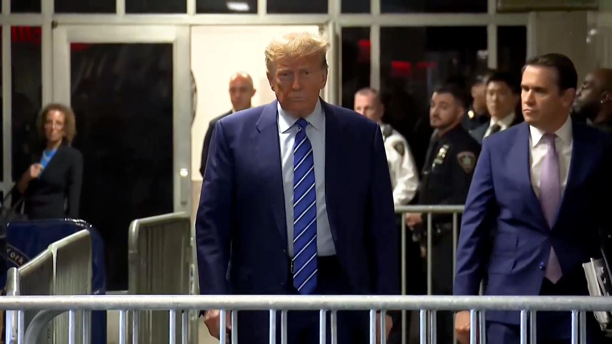Former U.S. President Donald Trump talks with reporters as he arrives for the start of the second day of his trial in Manhattan Criminal Court, New York City, New York, U.S. April 16, 2024.