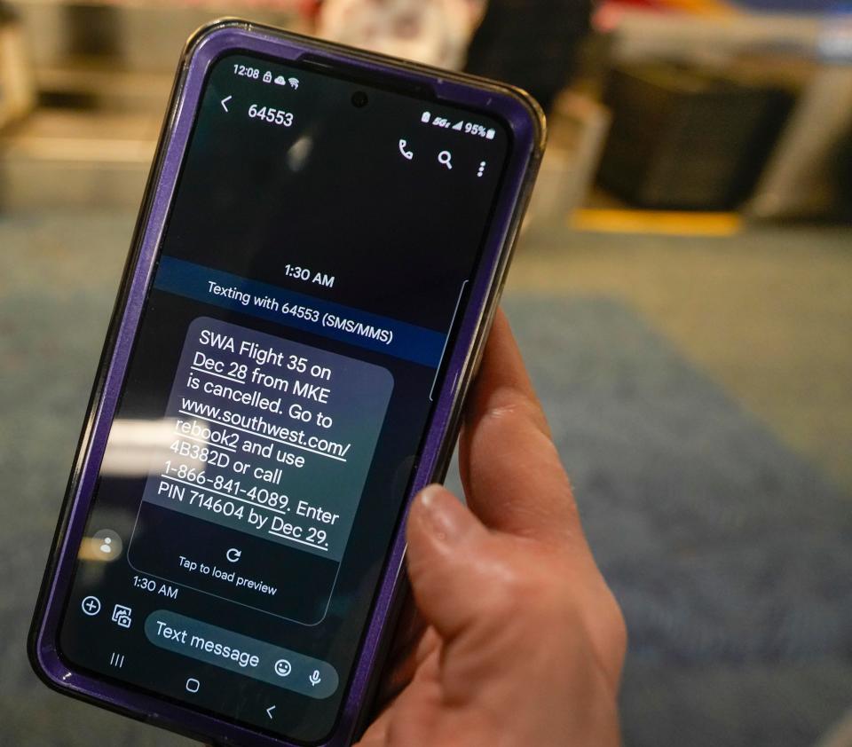 Southwest travelers received text message cancellation notifications that their flight tomorrow was canceled today Tuesday, Dec. 27, 2022, at Milwaukee Mitchell International Airport.