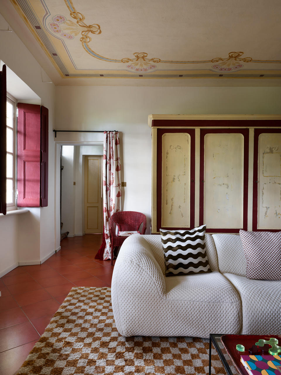 old italian living room with modern white sofa