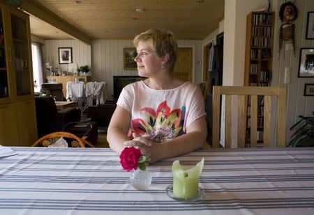 Laila Gustavsen, a former lawmaker whose daughter Marte Oedegaarden was a survivor of the July 22, 2011 Utoeya island massacre, poses for a photo at her home in Kongsberg July 10, 2014. REUTERS/Gwladys Fouche