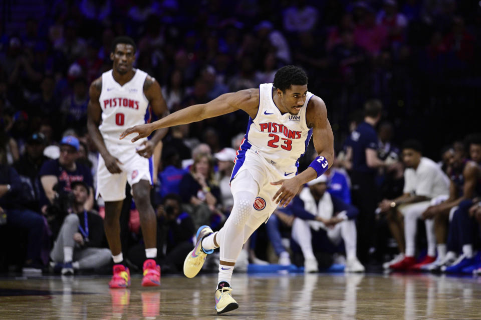 Detroit Pistons' Jaden Ivey reacts after a basket against the Philadelphia 76ers during the first half of an NBA basketball game Tuesday, April 9, 2024, in Philadelphia. (AP Photo/Derik Hamilton)