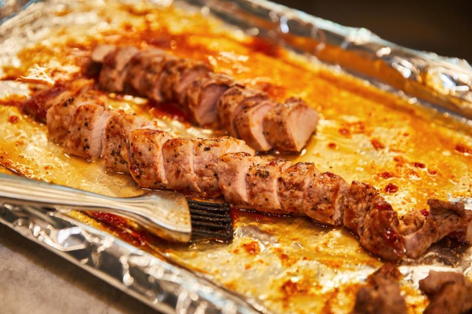 Preparation of sweet and sour pork tenderloin.