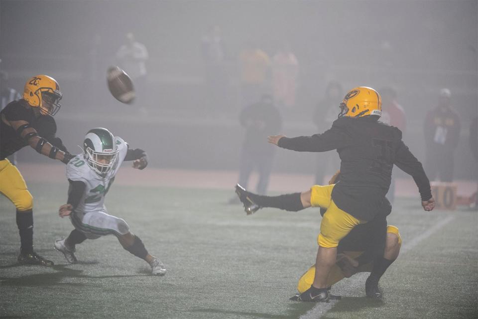 (11/12/21) Edison's Eric Rodriguez completes a PAT kick to score during a second round Sac-Joaquin Section football playoff game against St.Mary's at Edison's Magnasco Stadium in Stockton.  CLIFFORD OTO/THE STOCKTON RECORD