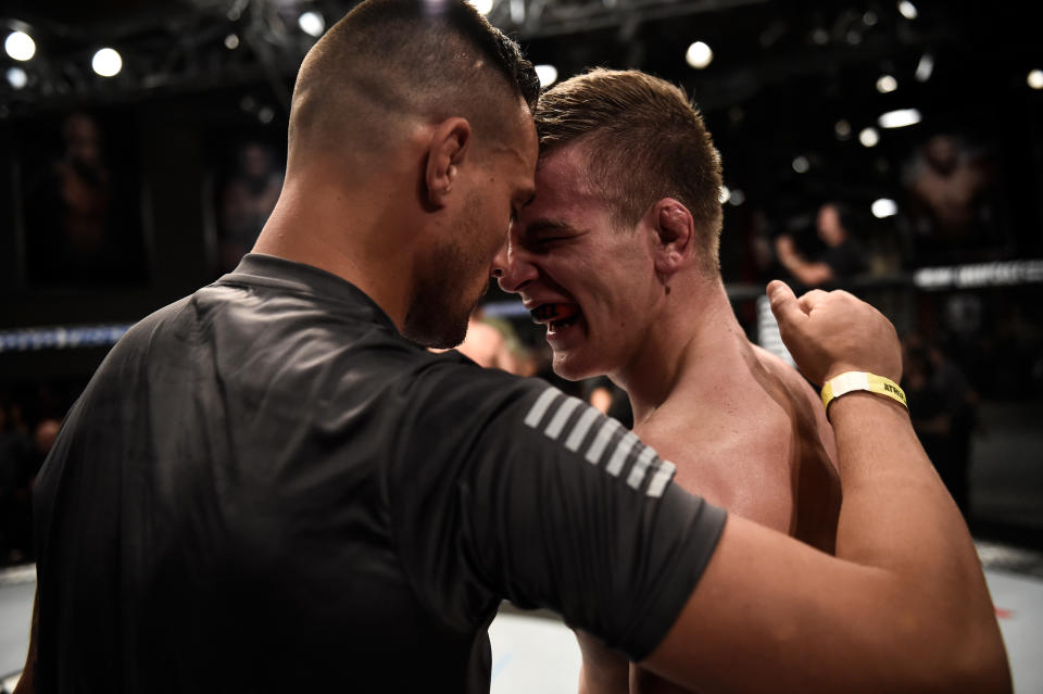 LAS VEGAS, NV - AUGUST 15:  (R-L) Grant Dawson  celebrates his victory with James Krause during Dana White's Tuesday Night Contender Series at the TUF Gym on August 15, 2017 in Las Vegas, Nevada. (Photo by Brandon Magnus/DWTNCS)