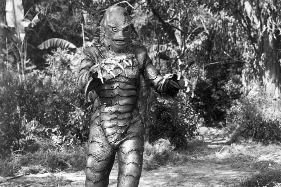 (Original Caption) 1954- Webbed hands and feet characterize this half-fish, half-man monster, the "Gill Man" who appeared in Universal's, "The Creature From the Black Lagoon," 1954. The actor, who was never seen as he really looked, Ricou Browning, is supposed to be the last survivor of a prehistoric race. Months of research and hundreds of drawings were necessary to create this creature. (Photo by George Rinhart/Corbis via Getty Images)