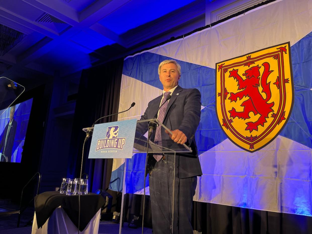 Nova Scotia Premier Tim Houston speaks at the Progressive Conservative annual general meeting in Halifax on Friday. (Michael Gorman/CBC - image credit)
