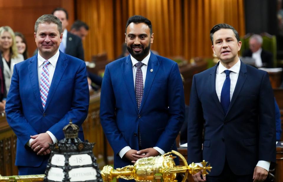 Conservative MP Arpan Khanna is introduced by Conservative Leader Pierre Poilievre, right, in the House of Commons on Parliament Hill in Ottawa on Monday, Sept. 18, 2023.