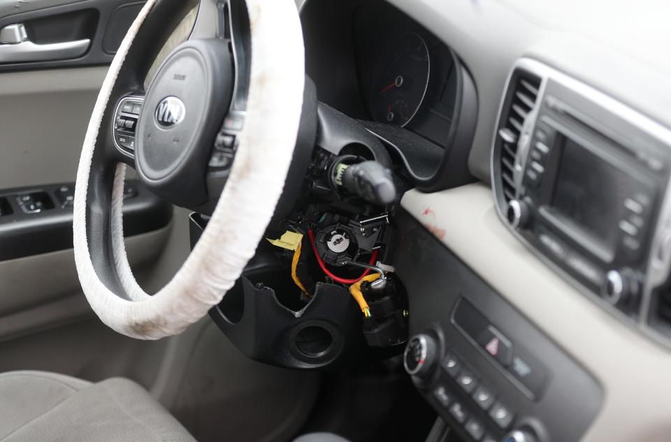 Steering column damage to a Kia  after it was stolen and later recovered. 