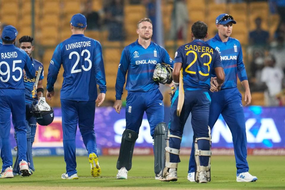 England captain Jos Butler reacts after losing to Sri Lanka by eight wickets at the Cricket World Cup in Bengaluru (Aijaz Rahi/AP) (AP)