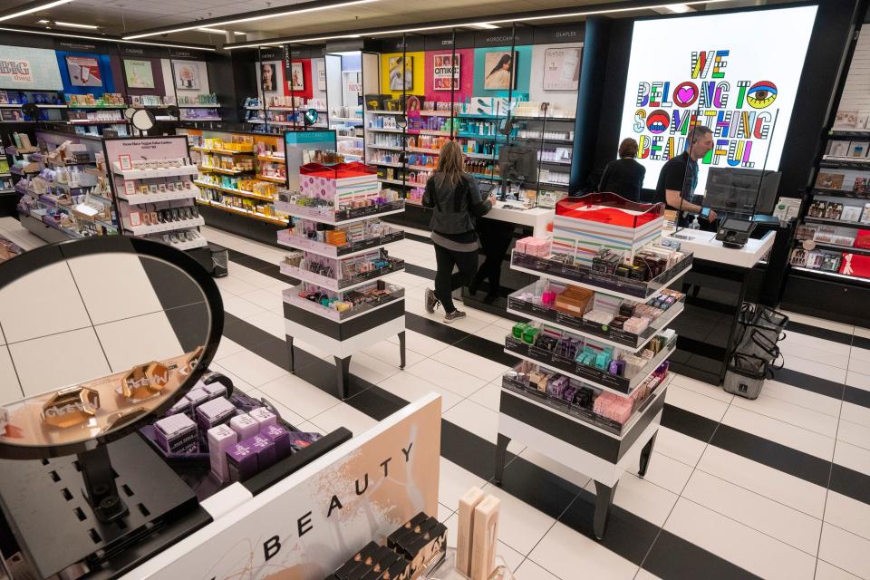 A customer purchases cosmetics Tuesday at Kohl’s in Brookfield. Shareholders on Wednesday voted in favor of the company's slate of candidates for the board, ending a fight with activist shareholders.
