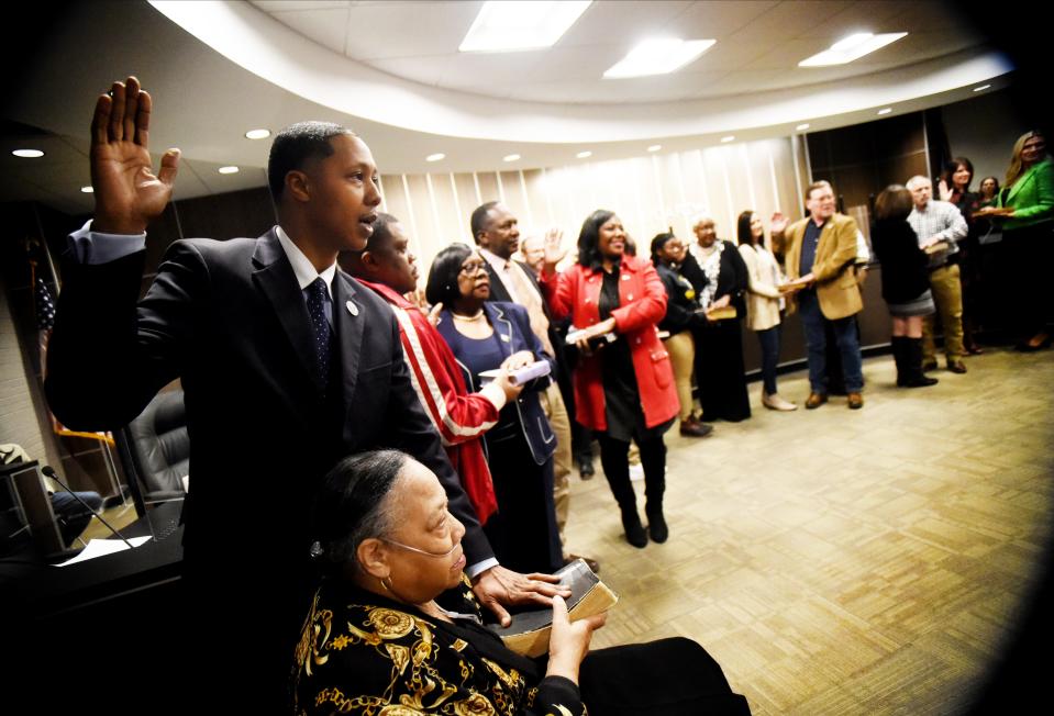 Dr. Terence Vinson gets sworn in as a Caddo Parish School Board member on January 10, 2023, at the Caddo Parish School Board.Ê