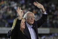 Democratic presidential candidate Sen. Bernie Sanders I-Vt., waves with his wife Jane after his speech at a campaign event in Tacoma, Wash., Monday, Feb. 17, 2020. (AP Photo/Ted S. Warren)
