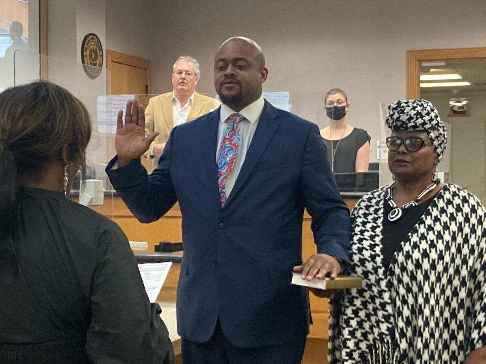 Steffon Jones is sworn in to his District 6 Caddo Parish Commission seat Monday afternoon in the Caddo Parish Government Plaza.