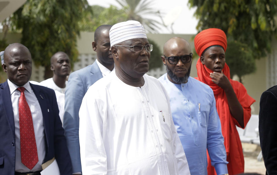 Nigerian presidential candidate, Atiku Abubakar, of the People's Democratic Party, arrives to speak with journalists after the presidential election was delayed by the Independent National Electoral Commission, at his residence in Yola, Nigeria, Saturday, Feb. 16, 2019. A civic group monitoring Nigeria's now-delayed election says the last-minute decision to postpone the vote a week until Feb. 23 "has created needless tension and confusion in the country." (AP Photo/Sunday Alamba)