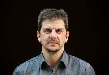 Aryballe Technologies CEO Tristan Rousselle poses after showing a prototype of NeOse, a universal portable odour detection device connected to a database, in Paris, April 20, 2016. REUTERS/Christian Hartmann