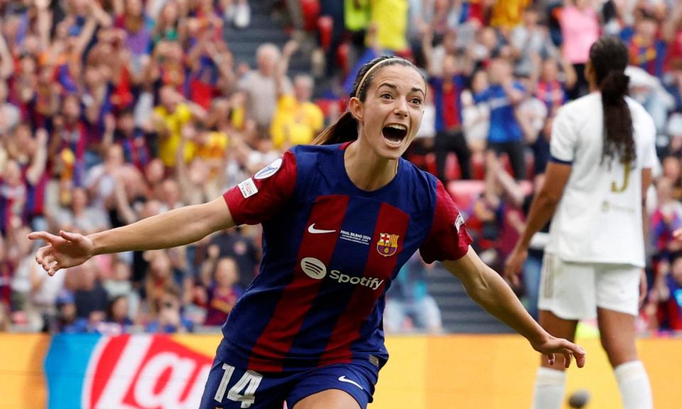 <span>Aitana Bonmatí celebrates after opening the scoring for <a class="link " href="https://sports.yahoo.com/soccer/teams/barcelona/" data-i13n="sec:content-canvas;subsec:anchor_text;elm:context_link" data-ylk="slk:Barcelona;sec:content-canvas;subsec:anchor_text;elm:context_link;itc:0">Barcelona</a> in the Women’s Champions League final against Lyon.</span><span>Photograph: Albert Gea/Reuters</span>