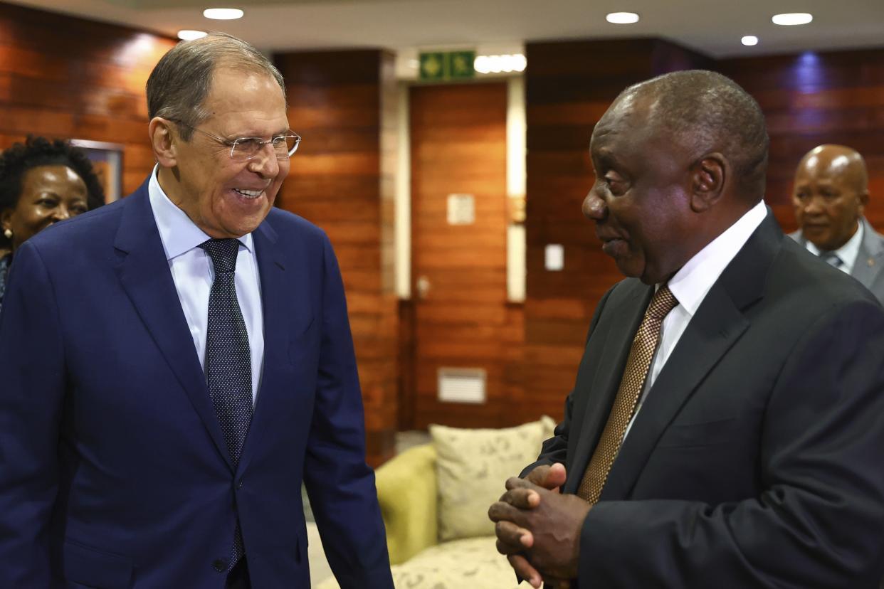 In this handout photo released by Russian Foreign Ministry Press Service, South African President Cyril Ramaphosa, right, and Russian Foreign Minister Sergey Lavrov talk during their meeting in Pretoria, South Africa, Monday, Jan. 23, 2023. (Russian Foreign Ministry Press Service via AP)