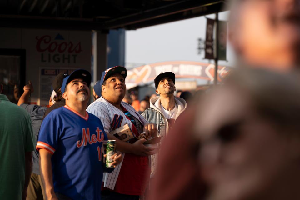 Fans watch a large screen during a Mets vs.Phillies game at Citi Field on Wednesday, May 31, 2023.