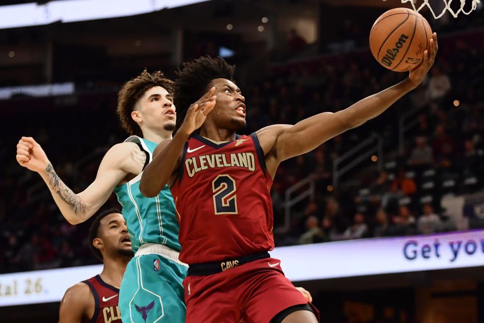 Oct. 22: Cavaliers guard Collin Sexton drives to the bucket past Hornets defender LaMelo Ball.