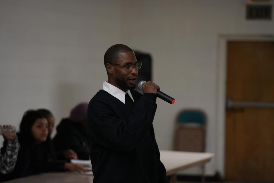 RJ Miller, executive director of Greater Opportunities and a host of  a youth town hall for teens and families on Monday, Feb. 13, 2023 at the Masonic Lodge at Sixth Avenue in Des Moines.