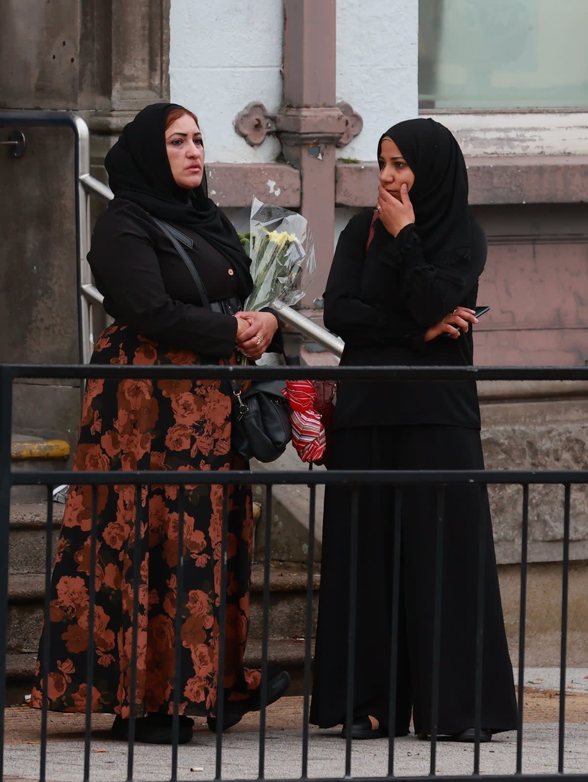 Mourners outside the family home of Dlava ahead of her service in Dublin (PA)