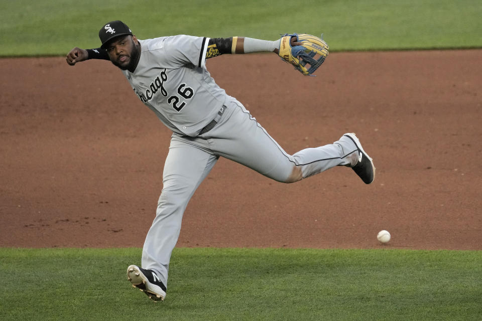 Chicago White Sox third baseman Hanser Alberto misses the catch on a single by Vinnie Pasquantino during the fourth inning of a baseball game Wednesday, May 10, 2023, in Kansas City, Mo. (AP Photo/Charlie Riedel)