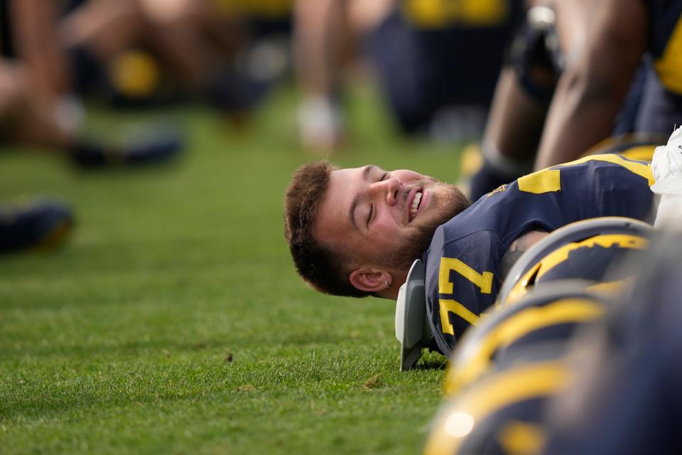 Michigan offensive lineman Trevor Keegan warms up during practice on Friday, Dec. 29, 2023, in Carson, California.