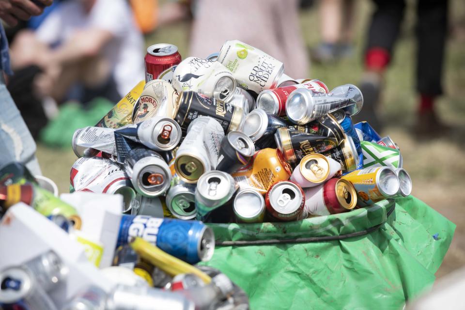 Drinks cans overflow a recycling bin on day 3 of Glastonbury 2019, Worthy Farm, Pilton, Somerset. Picture date: Friday 28th June 2019.  Photo credit should read:  David Jensen/EmpicsEntertainment