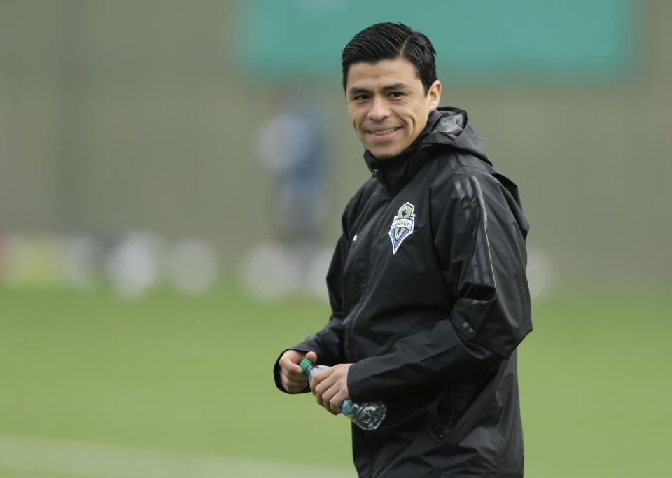 FILE - Seattle Sounders assistant coach and former player Gonzalo Pineda watches drills during a training session in Tukwila, Wash., in this Tuesday, Jan. 24, 2017, file photo. Atlanta United hired former Seattle assistant coach Gonzalo Pineda as the team’s head coach on Thursday, Aug. 13, 2021. Pineda, whose contract runs through 2024, replaces Gabriel Heinze, who was fired last month.(AP Photo/Ted S. Warren, File)