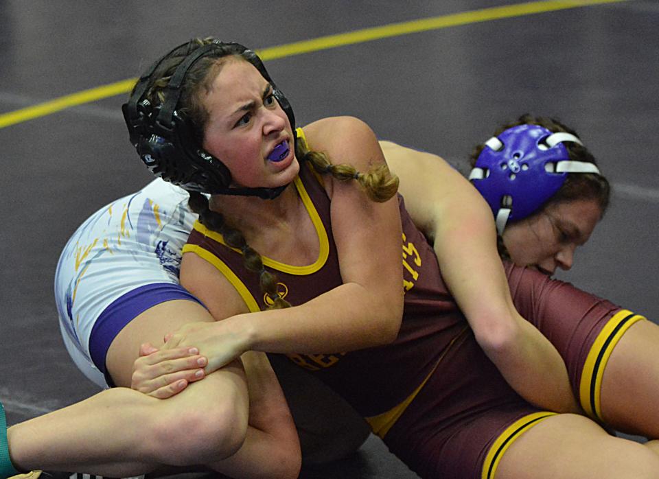 Webster Area's Jocelyn Rumpca and Watertown's Hayden Thomas lock up during their 120-pound girls match in the Marv Sherrill Dual wrestling tournament on Saturday, Dec. 2, 2023 in the Watertown Civic Arena.
