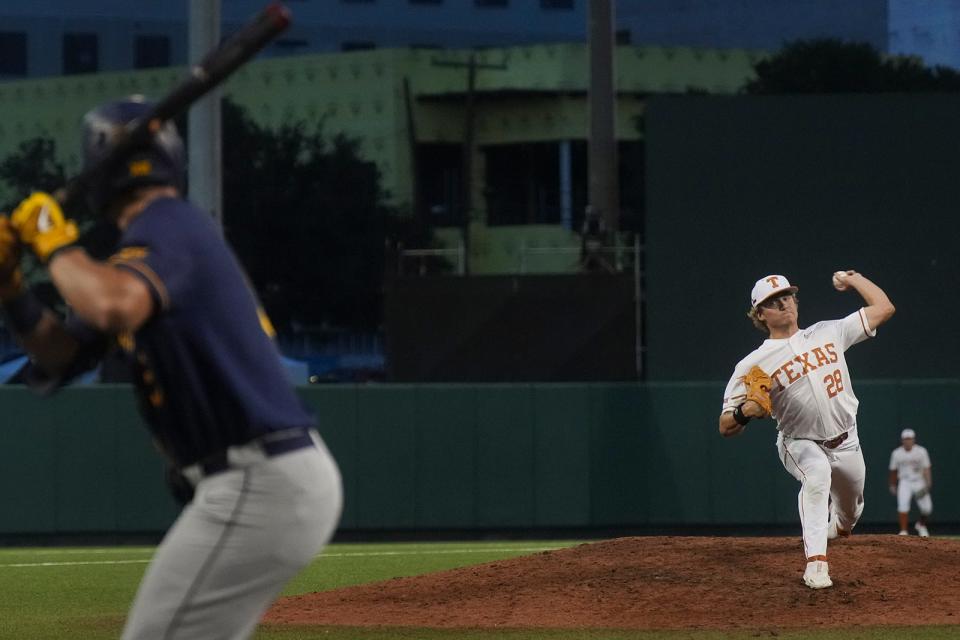 Texas pitcher Ace Whitehead delivers to the mound as the Longhorns play West Virginia at home last season. This past weekend the third-year reliever got the victory when he entered with one out in the fifth inning and finished out the game. It was the longest outing of his career.