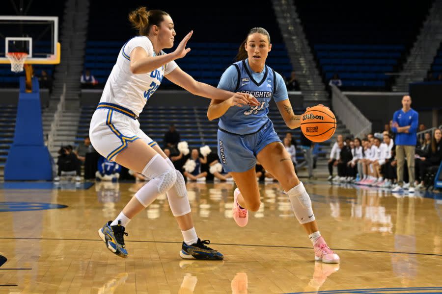 LOS ANGELES, CALIFORNIA – MARCH 25: Emma Ronsiek #31 of the Creighton Bluejays drives against Angela Dugalic #32 of the UCLA Bruins during the second round of the 2024 NCAA Women’s Basketball Tournament held at UCLA Pauley Pavilion on March 25, 2024 in Los Angeles, California. (Photo by John W. McDonough/NCAA Photos via Getty Images)