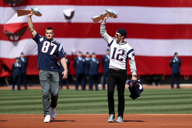 Tom Brady takes batting practice with Rob Gronkowski