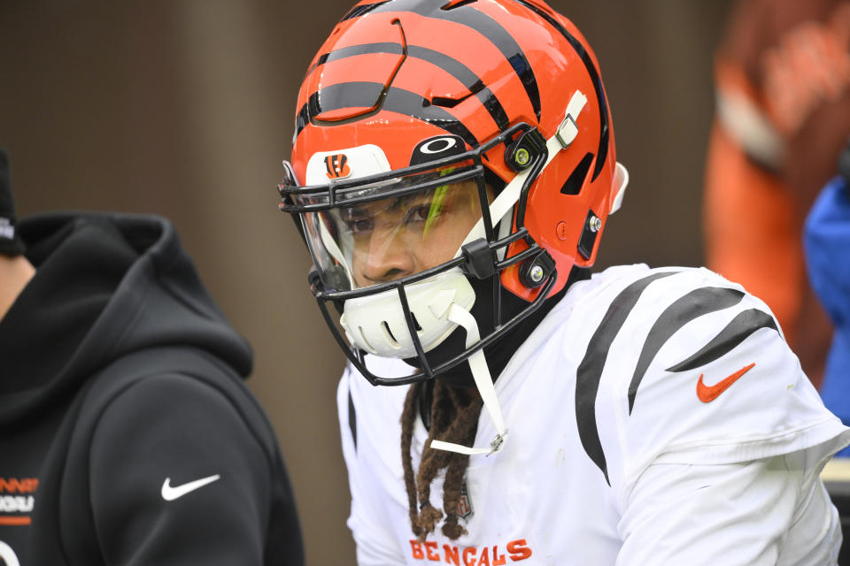 Cincinnati Bengals cornerback Vernon Hargreaves III (29) is carted off the field after an injury during the first half of an NFL football game against the Cleveland Browns, Sunday, Jan. 9, 2022, in Cleveland. (AP Photo/David Richard)