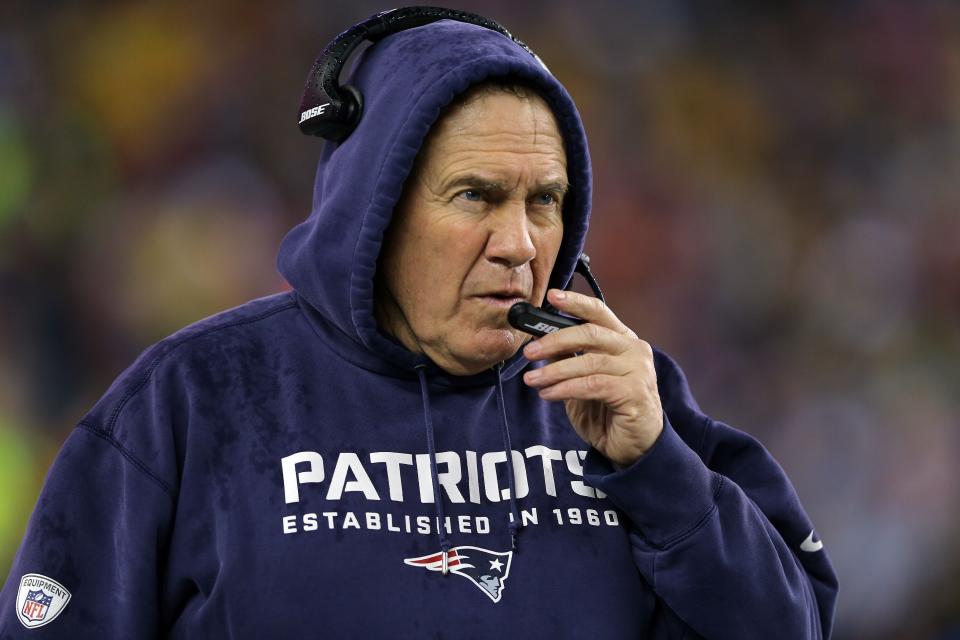 FOXBORO, MA - JANUARY 18: Head coach Bill Belichick of the New England Patriots looks on from the sidleine in the first quarter against the Indianapolis Colts of the 2015 AFC Championship Game at Gillette Stadium on January 18, 2015 in Foxboro, Massachusetts.  (Photo by Elsa/Getty Images)