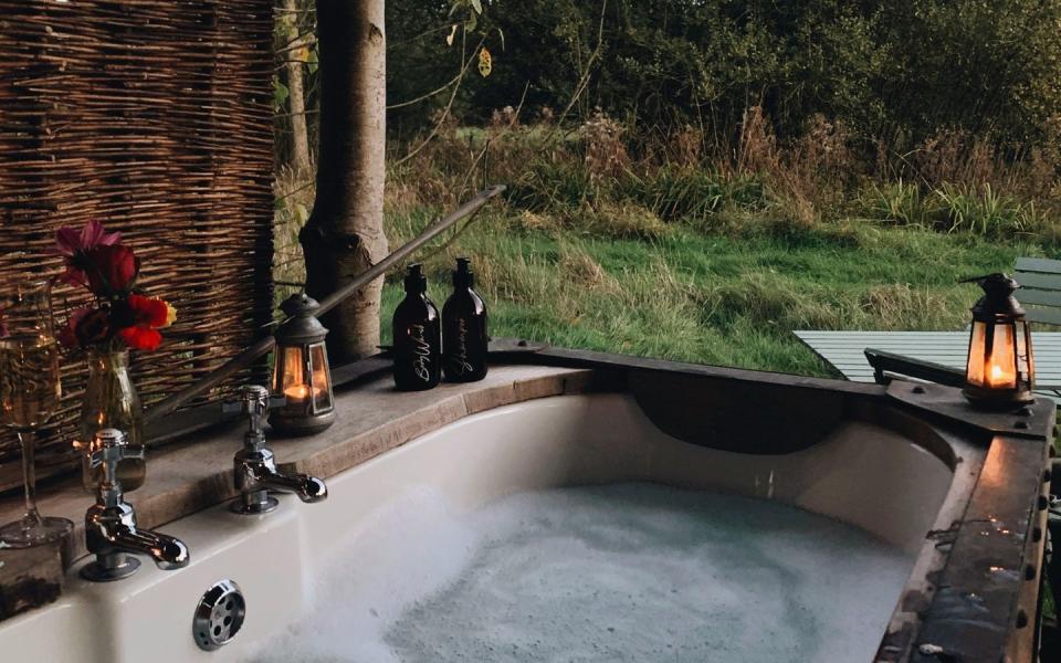 <p>There’s nothing quite like sipping on a glass of prosecco while lying in an outdoor bath in the countryside. And that’s exactly what we’ll be doing with our S.O. this summer at Albion Nights. </p><p>A quaint eco-cabin in six acres of wildflower meadows, this property is self-catered and just 15 minutes away from the city of Norwich, with hiking and wild swimming on offer nearby. What's more, hosts have just introduced wellness treatments such as massages, reiki and reflexology.</p><p>With comfort at the heart of everything here, the open plan living space is rustic but warm and comes with a hob and fridge to store bubbly and ingredients for romantic home-cooked meals. Our favourite bit (other than the tub, of course) is the all-wooden interiors in the bedroom. </p><p><a class="link " href="https://thewanderlist.uk/properties/albion-nights/" rel="nofollow noopener" target="_blank" data-ylk="slk:BOOK HERE;elm:context_link;itc:0;sec:content-canvas">BOOK HERE</a></p>