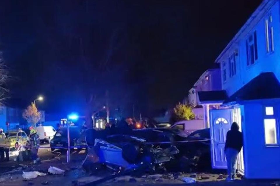 Two injured in horror crash as car flips into house on icy road (@UB1UB2)