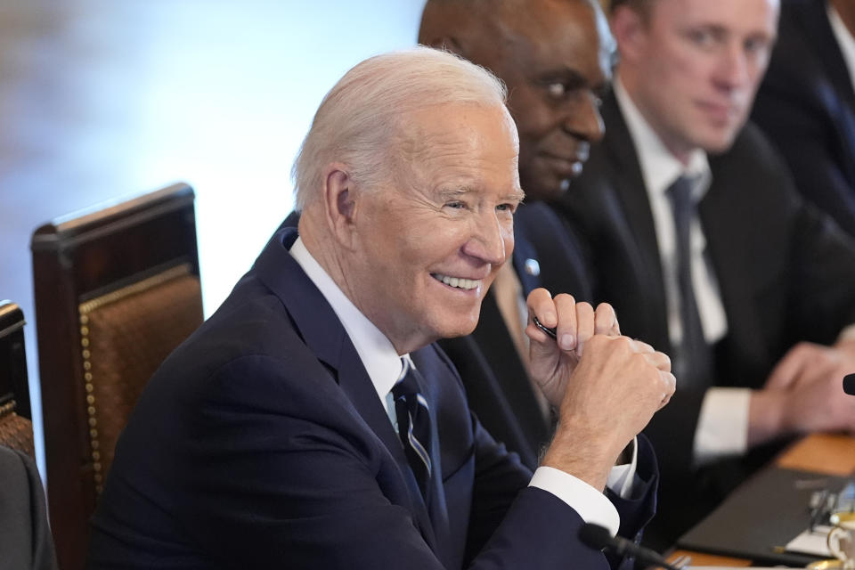 President Joe Biden smiles as he meets with Polish President Andrzej Duda and Polish Prime Minister Donald Tusk in the East Room of the White House, Tuesday, March 12, 2024, in Washington. Watching are Defense Secretary Lloyd Austin and White House national security adviser Jake Sullivan. (AP Photo/Andrew Harnik)