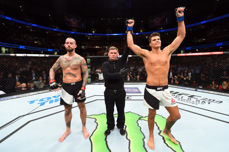 CM Punk lost in his UFC debut to Mickey Gall (R) at UFC 203 on Sept. 10, 2016, in Cleveland. (Getty Images)