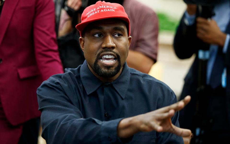 Kanye West's account was taken down following a series of anti-Semitic tweets - AP Photo/Evan Vucci